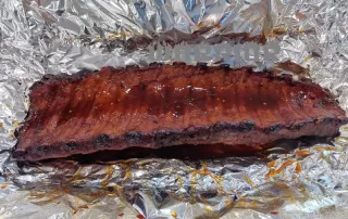 Smokey Tender Juicy Rack Of Baby Back Ribs Fresh Out Of Foil Wrap